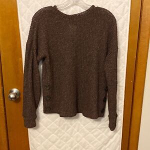 Think brown sweater with button detail